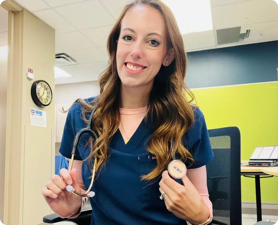 A registered nurse providing compassionate care to a patient in a clinical setting