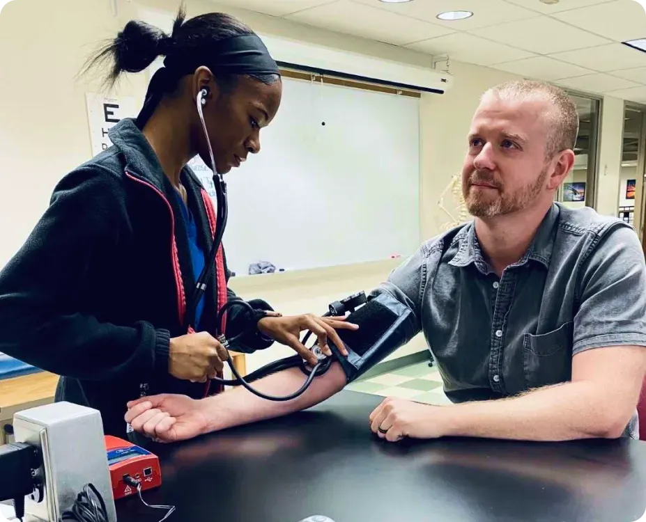An LPN-to-RN student developing advanced nursing skills through hands-on learning and clinical practice