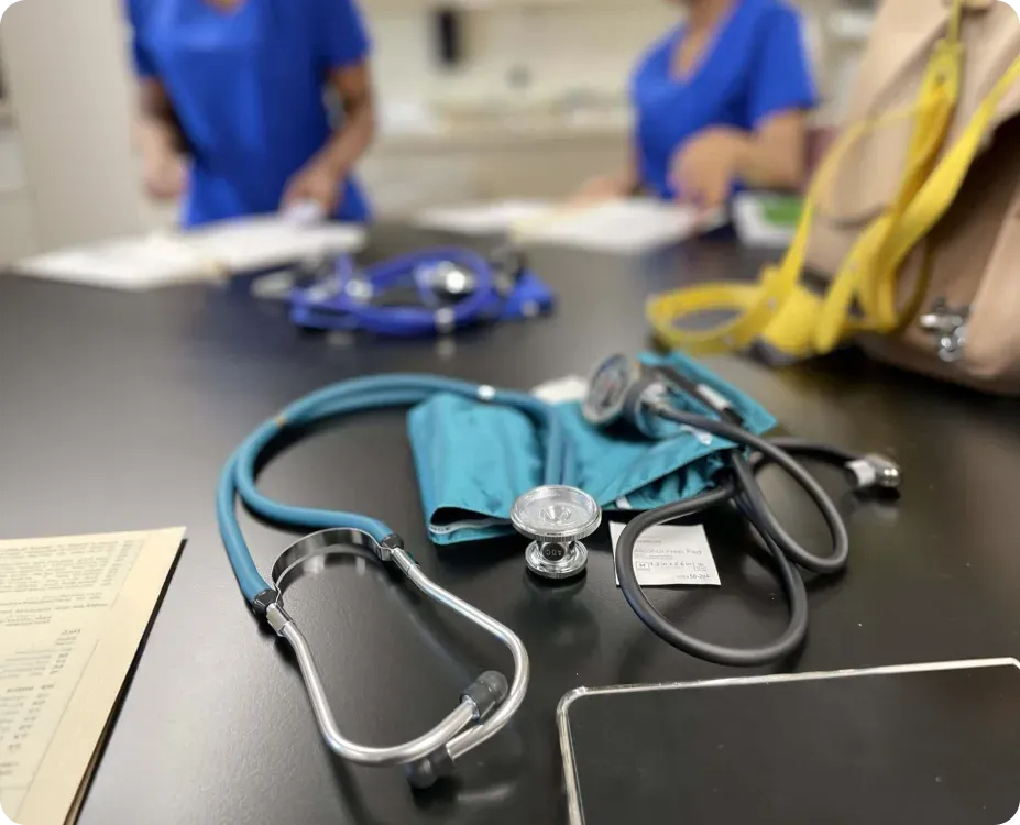 A respiratory therapist providing care to a patient in a hospital setting