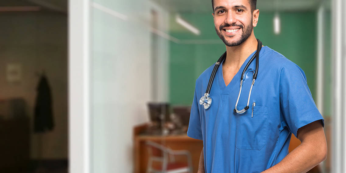 male nurse take classes at St. Louis College of Health Careers