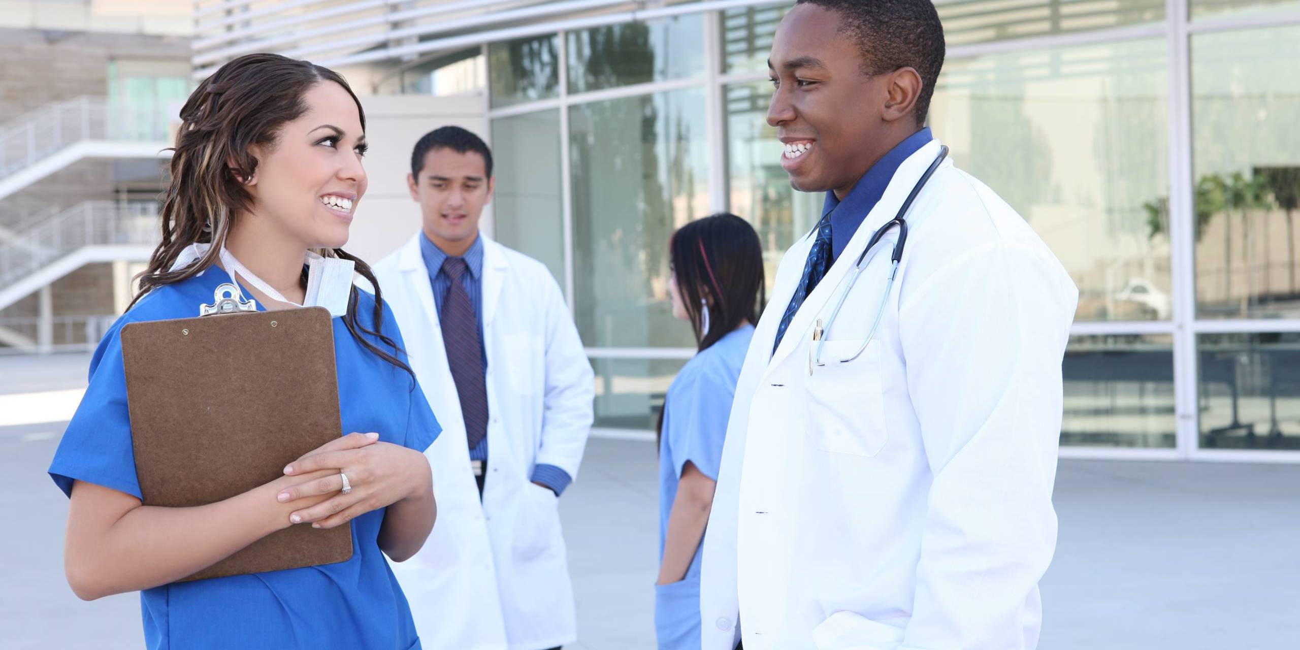 medical team outside building-min medical team outside building