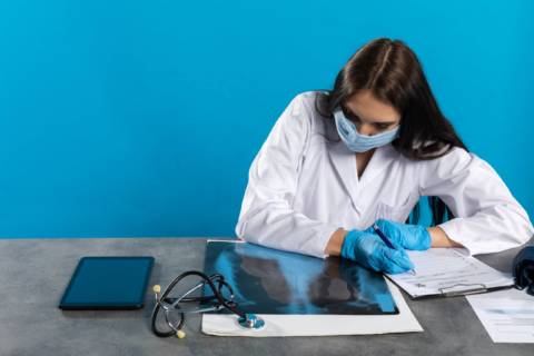 pulmonologist pulmonologist sits and reads xrays