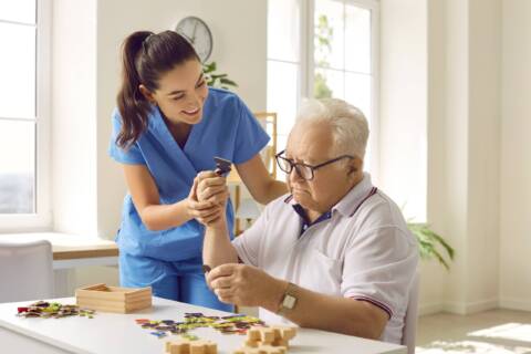 Geriatric Care geriatric care professional is assisting an elderly patient in St. Louis