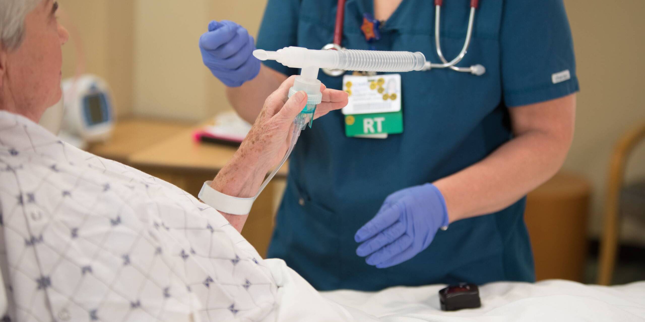 Respiratory Therapy respiratory therapist working with patient in St. Louis