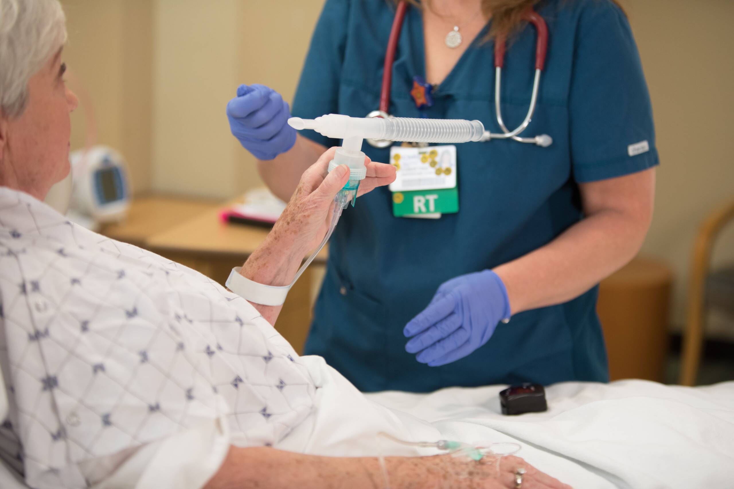 Respiratory Therapy respiratory therapist working with patient in St. Louis