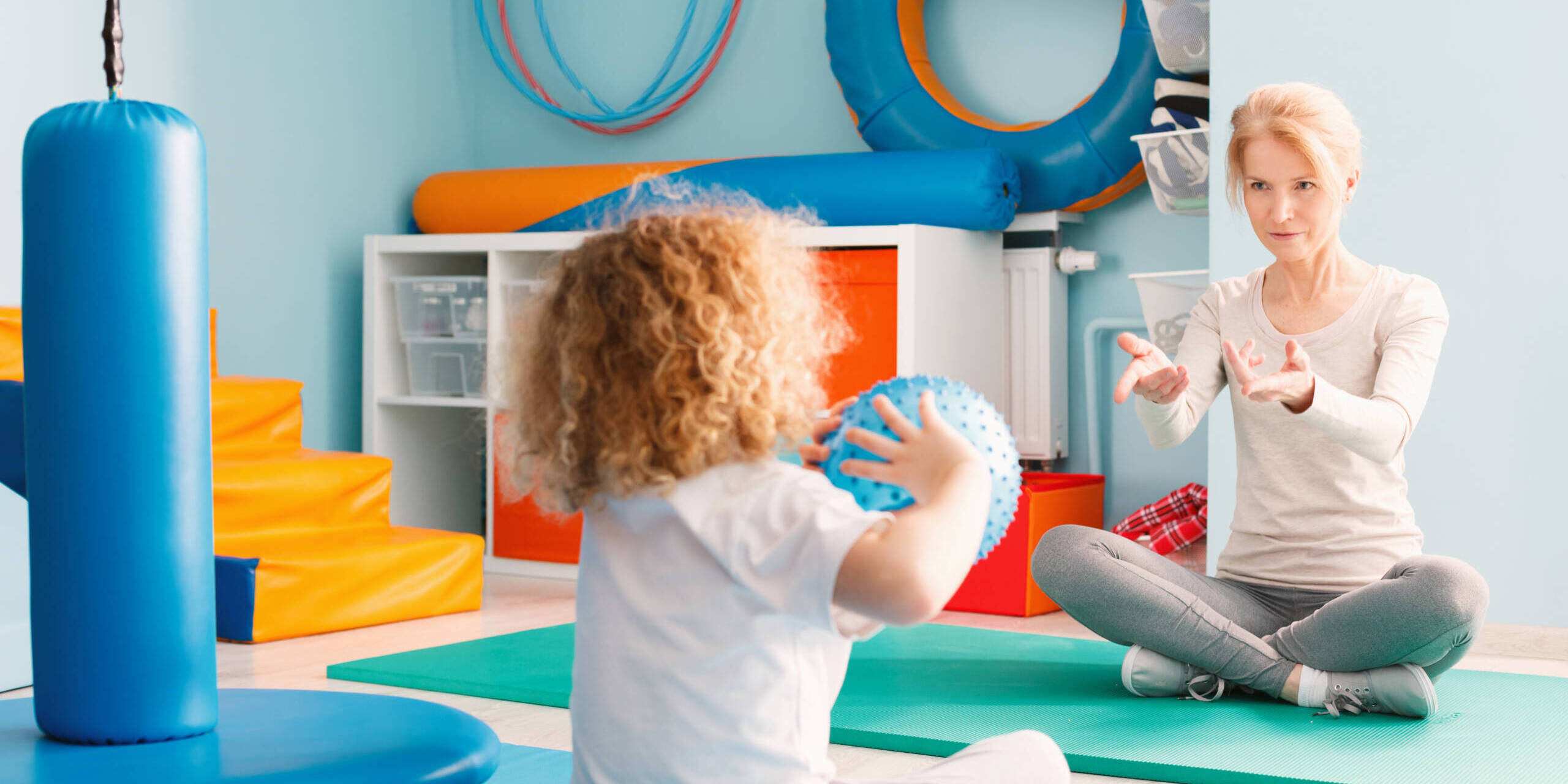 occupational therpay in pediatric care a child is working with an occupational therapist in pediatric care