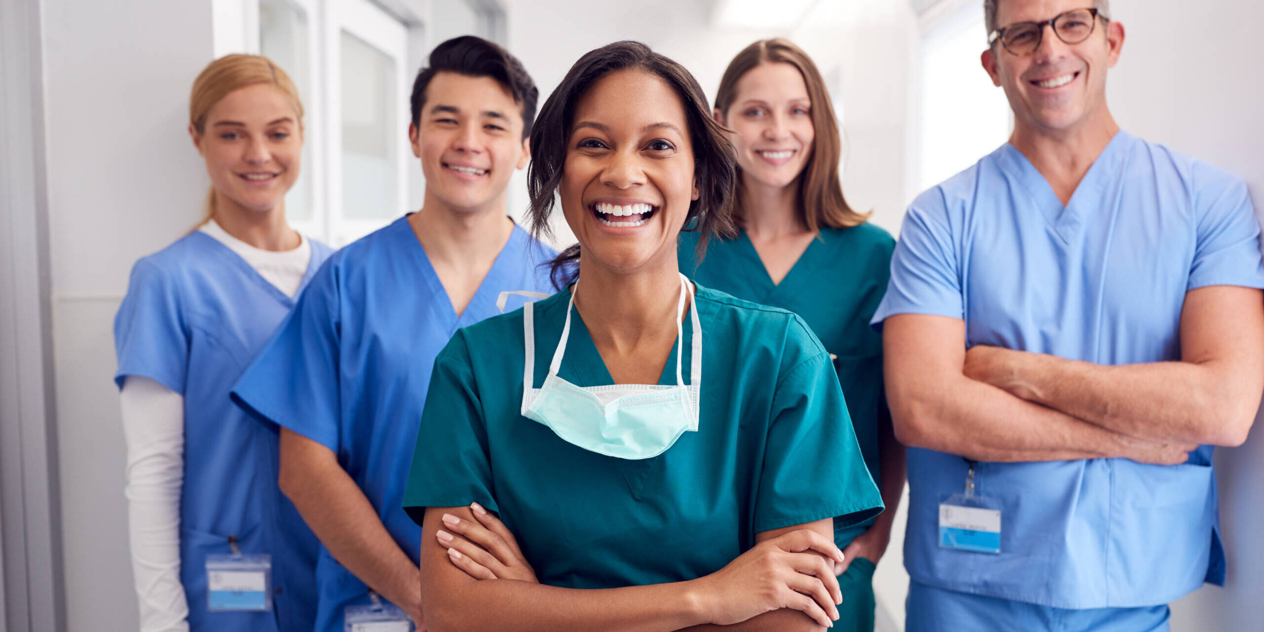 group of happy male and female nurses